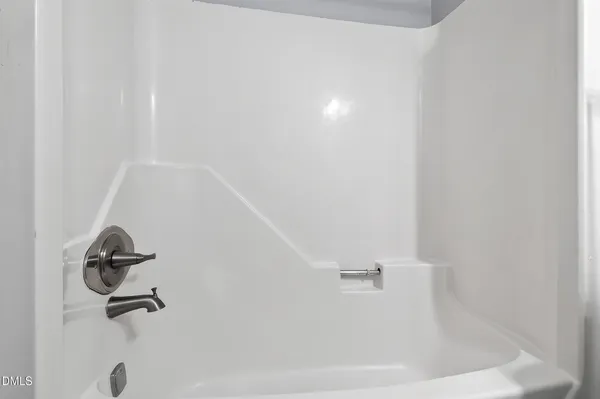 a view of a bathtub in a bathroom