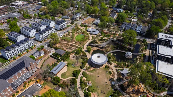 an aerial view of a house with a garden