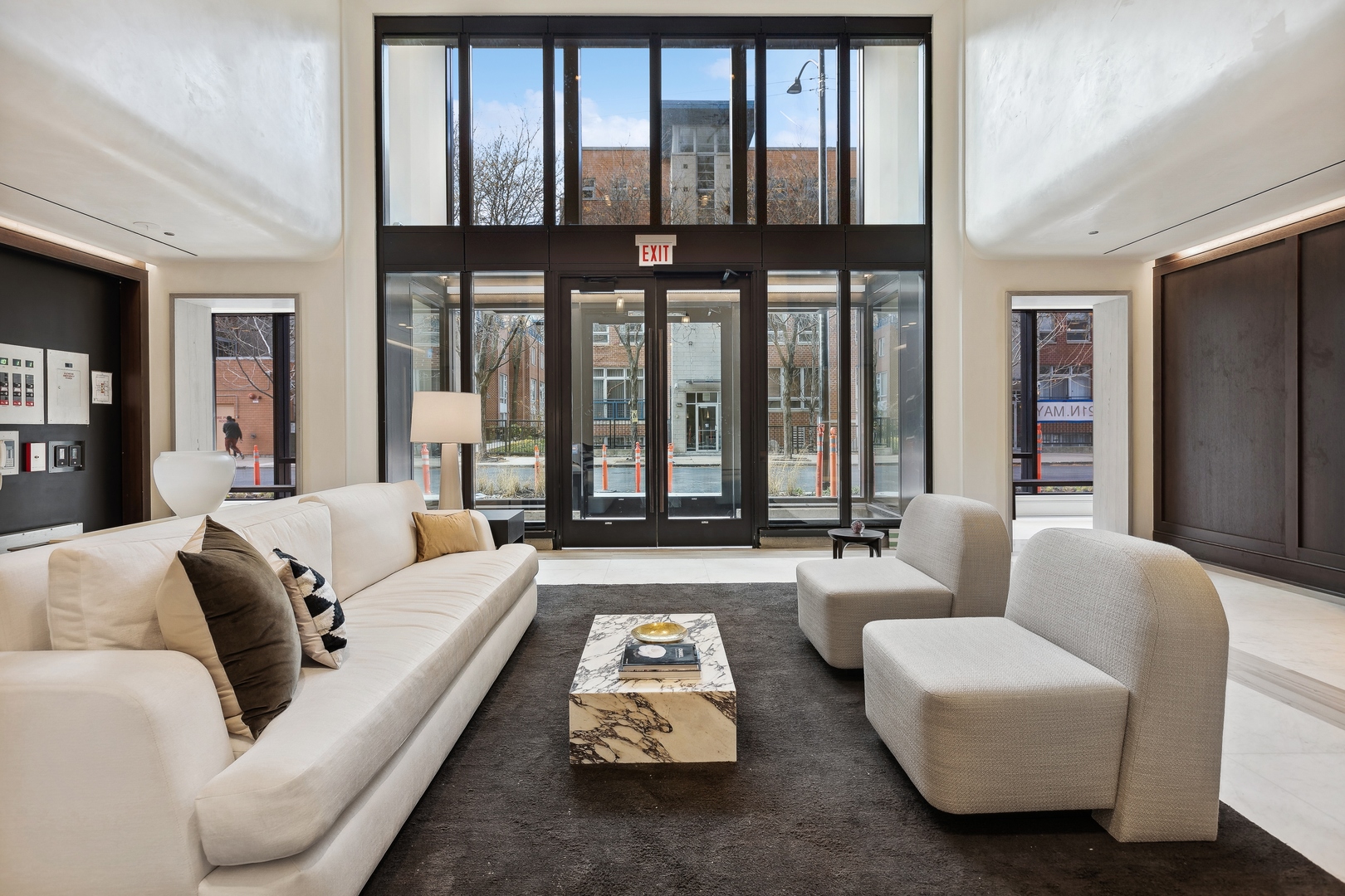 21 North May Street, Unit 1104 Chicago, IL 60607 - Photo 4 of 36 a living room with furniture and a large window
