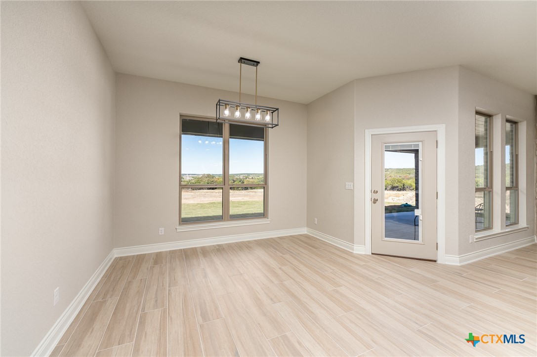 4249 Cold Springs Road Kempner, TX 76539 - Photo 15 of 48 wooden floor in an empty room with a window