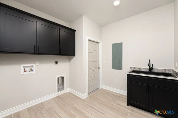 a view of cabinets with wooden floor