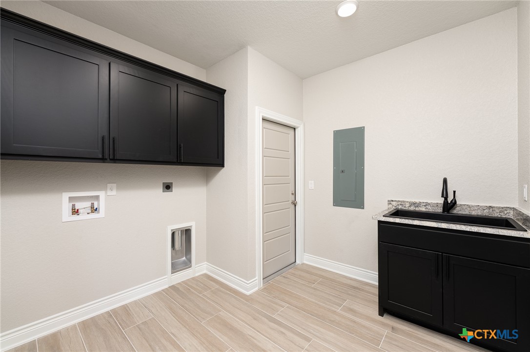 4249 Cold Springs Road Kempner, TX 76539 - Photo 17 of 48 a view of cabinets with wooden floor