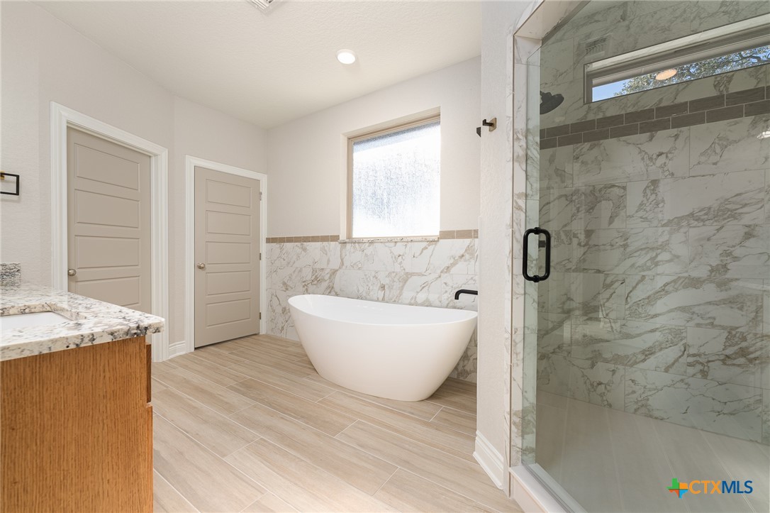 4249 Cold Springs Road Kempner, TX 76539 - Photo 24 of 48 a view of bathroom with bathtub and shower