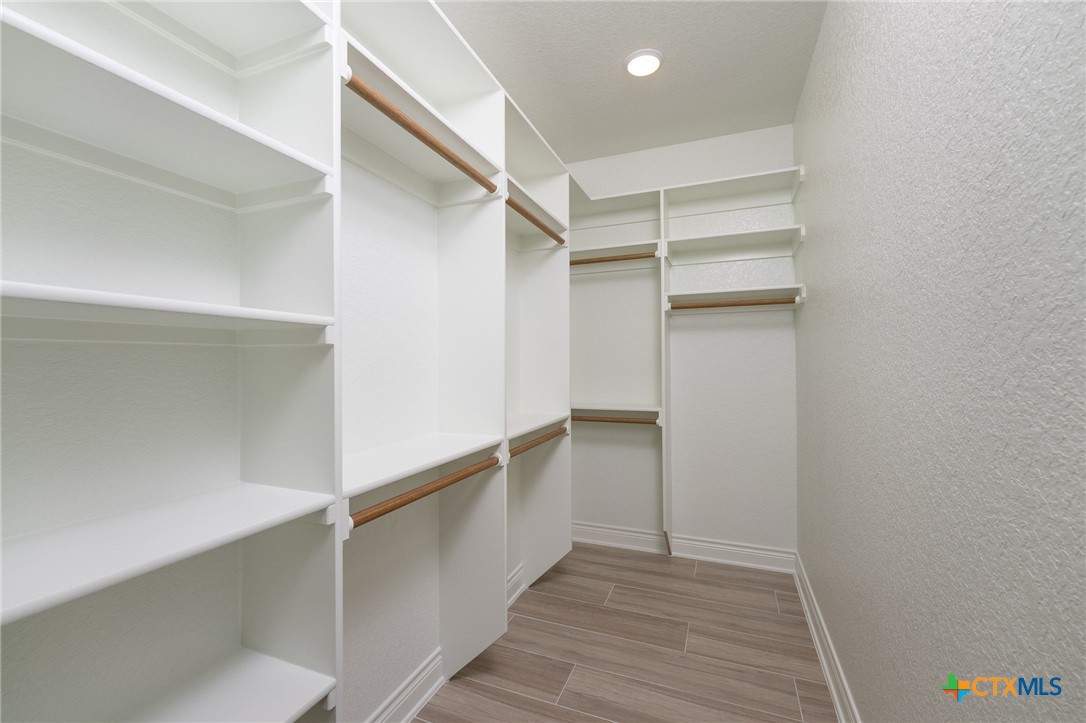 4249 Cold Springs Road Kempner, TX 76539 - Photo 27 of 48 a view of walk in closet with empty racks