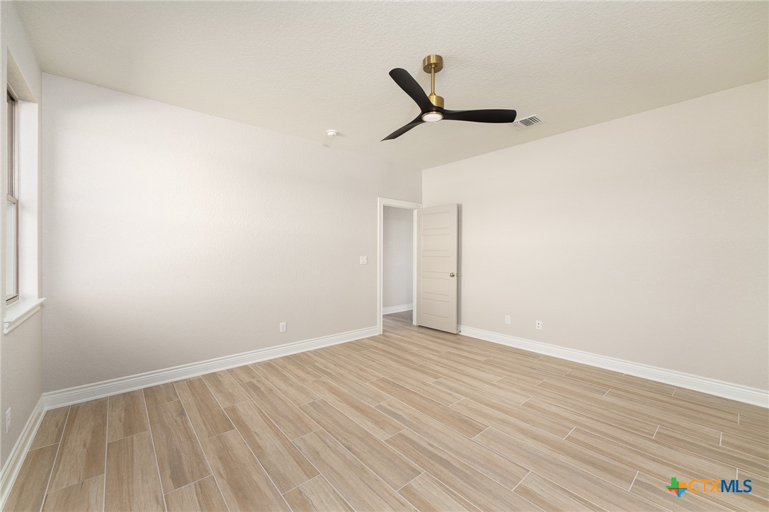 4249 Cold Springs Road Kempner, TX 76539 - Photo 31 of 48 a view of a room with wooden floor