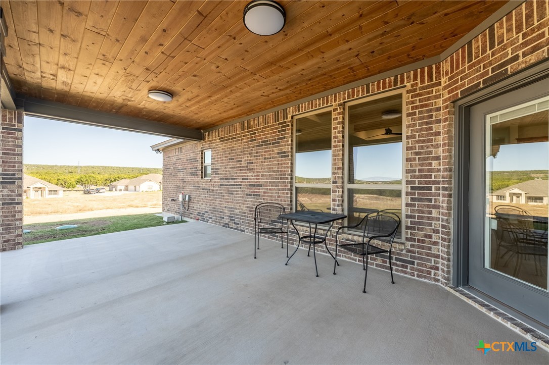 4249 Cold Springs Road Kempner, TX 76539 - Photo 37 of 48 a view of an chairs and tables in patio