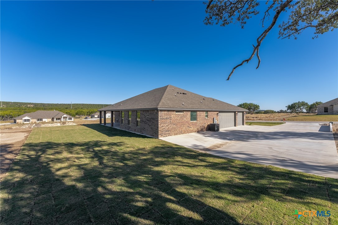 4249 Cold Springs Road Kempner, TX 76539 - Photo 41 of 48 a view of a house with a yard