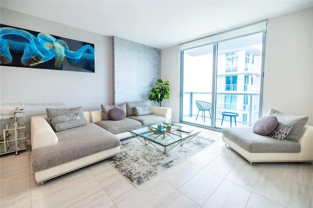 a kitchen with stainless steel appliances granite countertop a refrigerator and a stove
