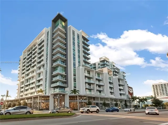 a view of a building and a street