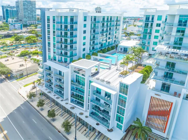 a view of a city with tall buildings