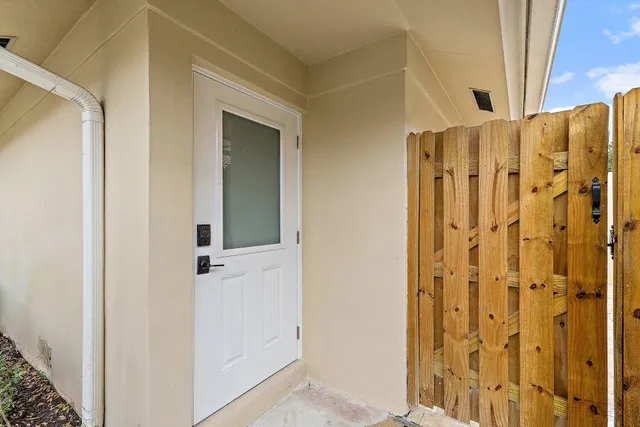 a bathroom with vanity two mirror and