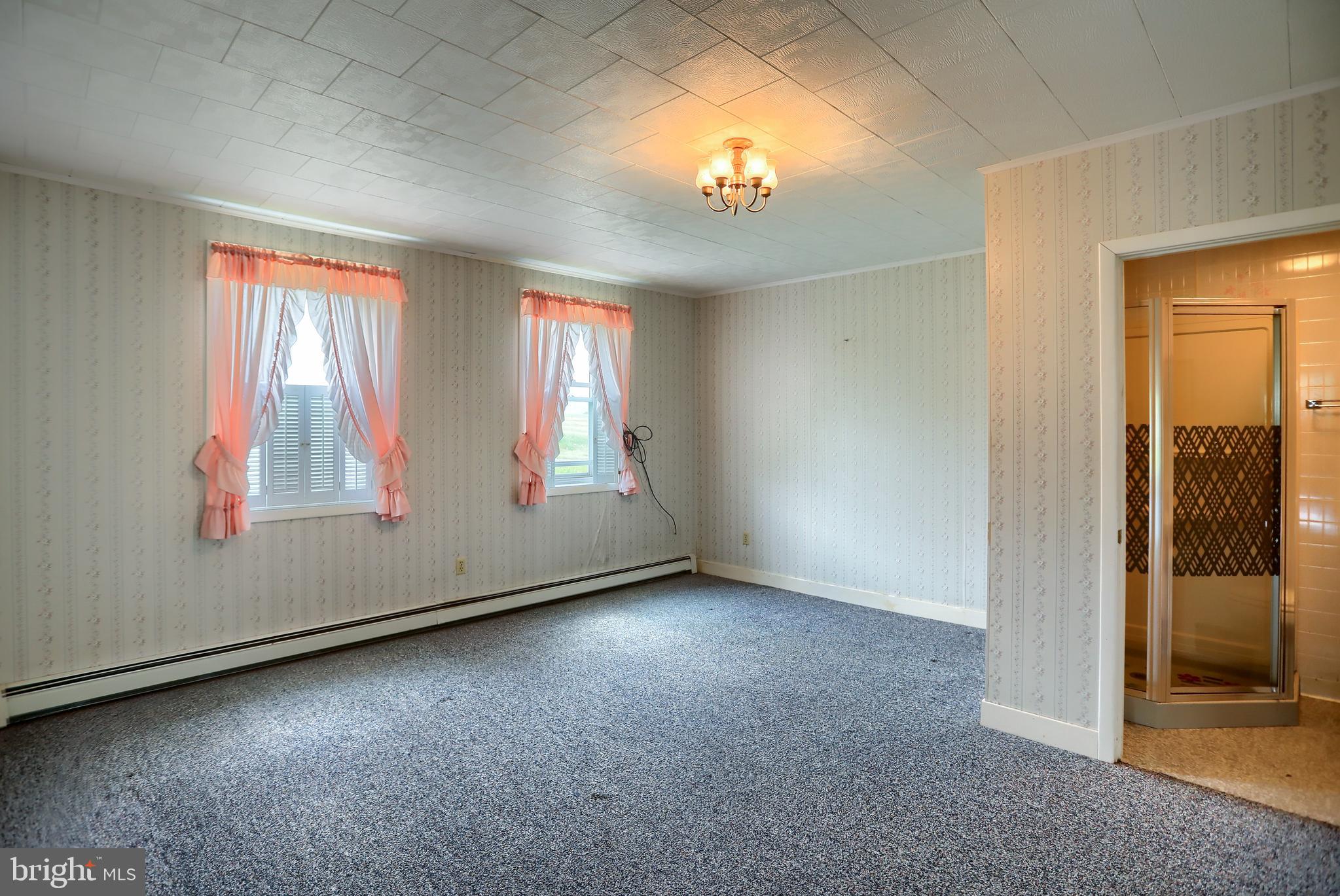 118 Bunker Hill Road Belleville, PA 17004 - Photo 13 of 90 an empty room with windows and an empty room