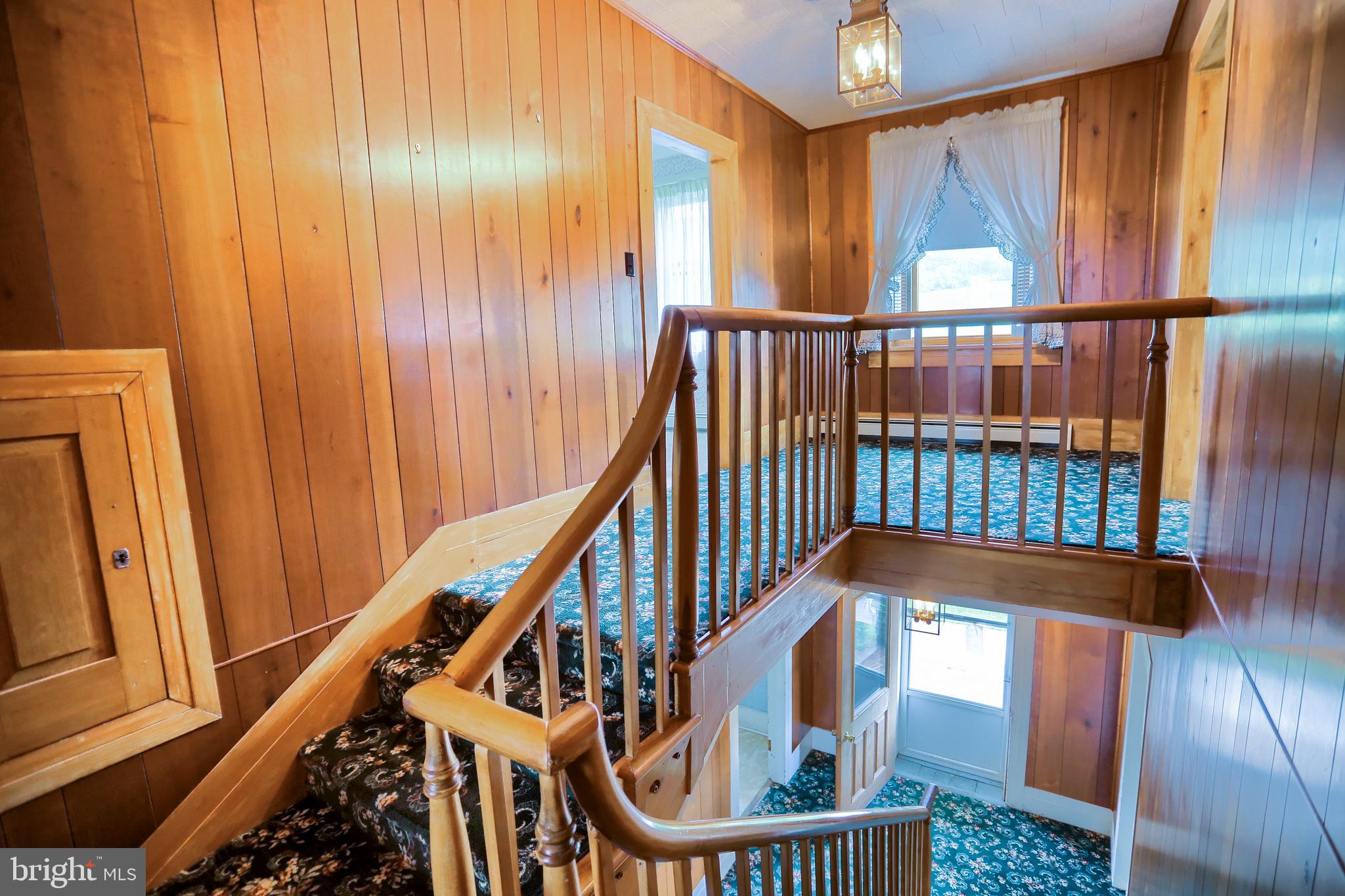 118 Bunker Hill Road Belleville, PA 17004 - Photo 23 of 90 a view of staircase with railing and a window