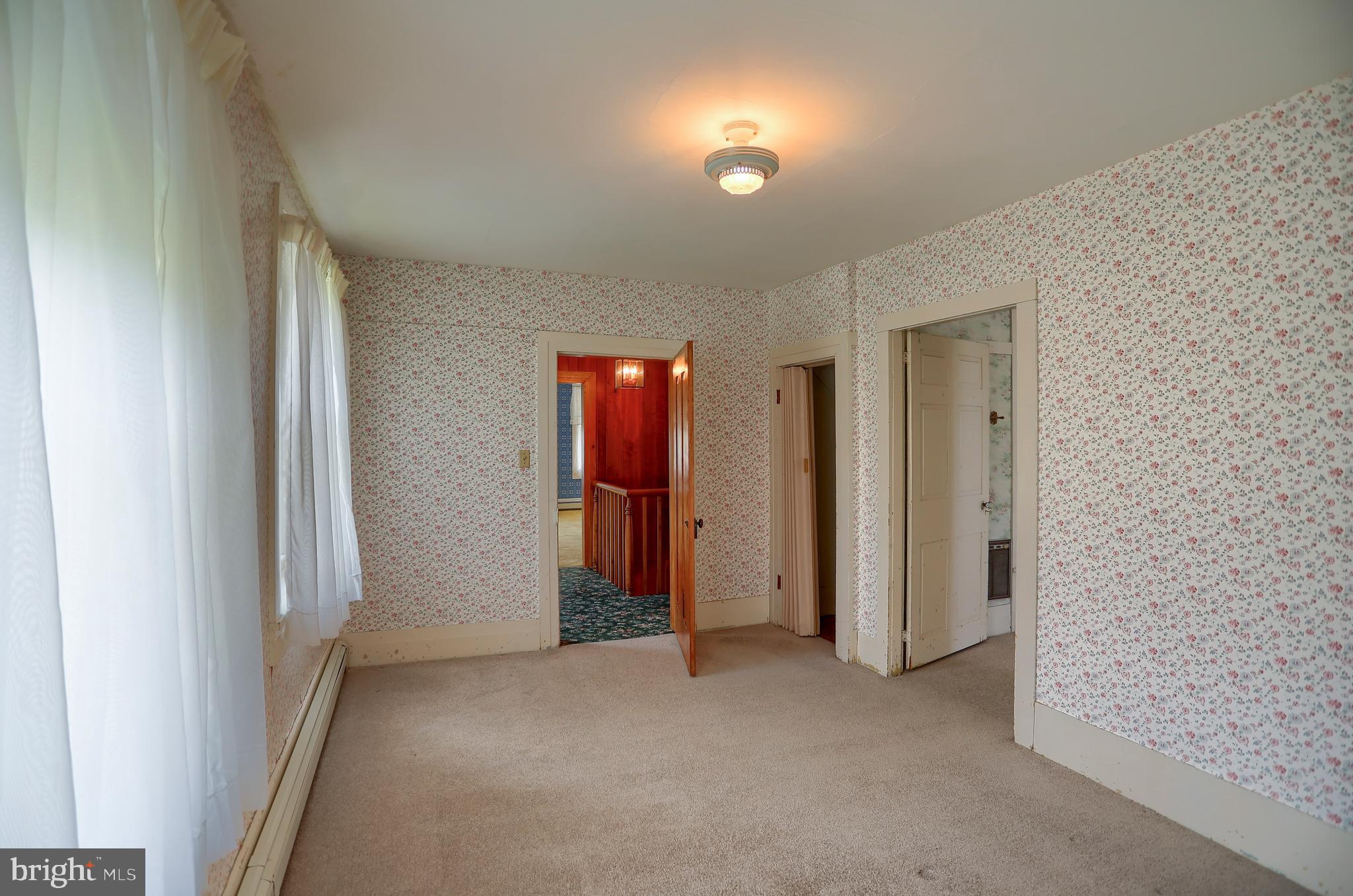 118 Bunker Hill Road Belleville, PA 17004 - Photo 37 of 90 an empty room with closet and windows