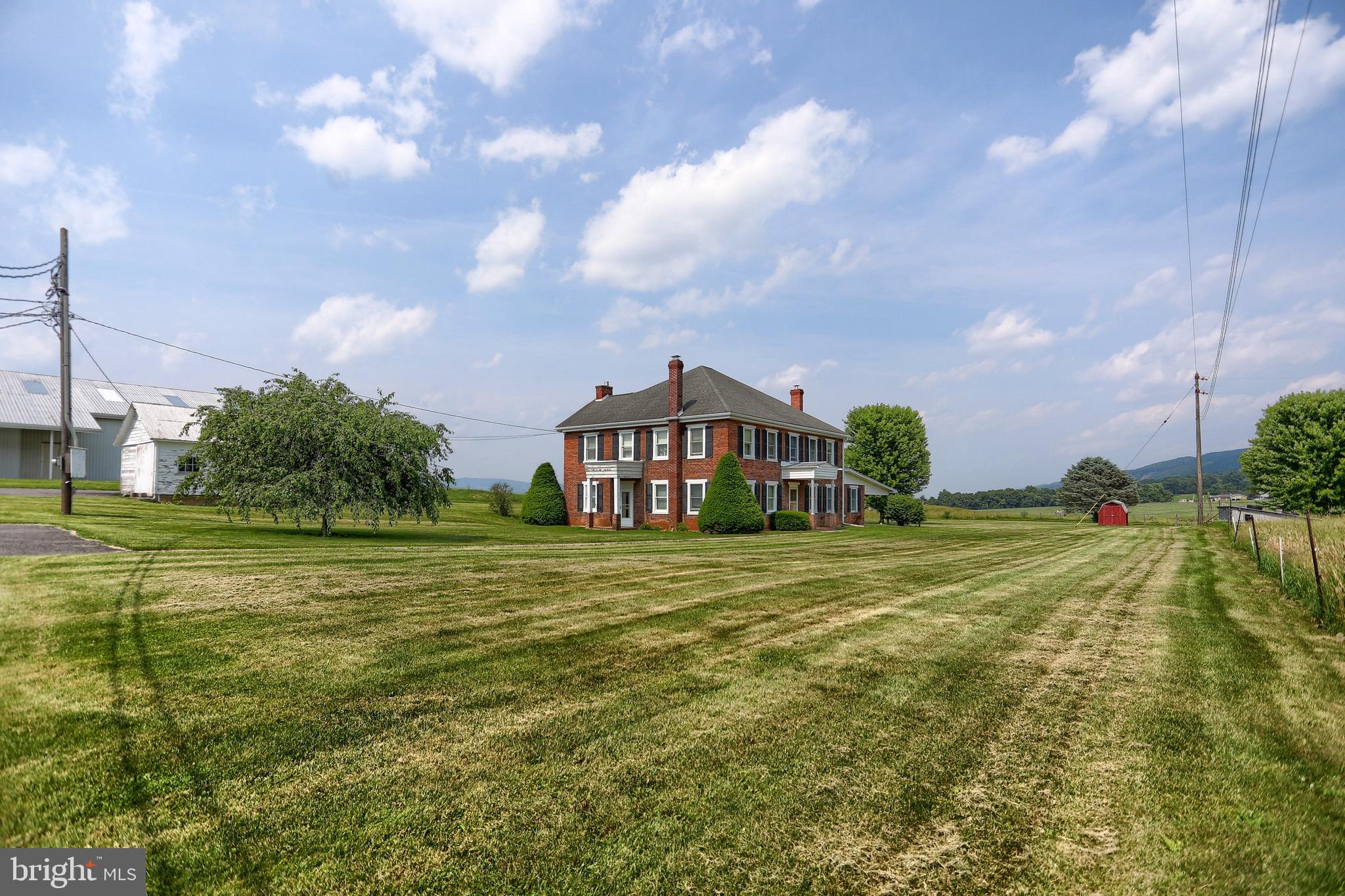 118 Bunker Hill Road Belleville, PA 17004 - Photo 4 of 90 a view of a big room with a big yard and a large tree
