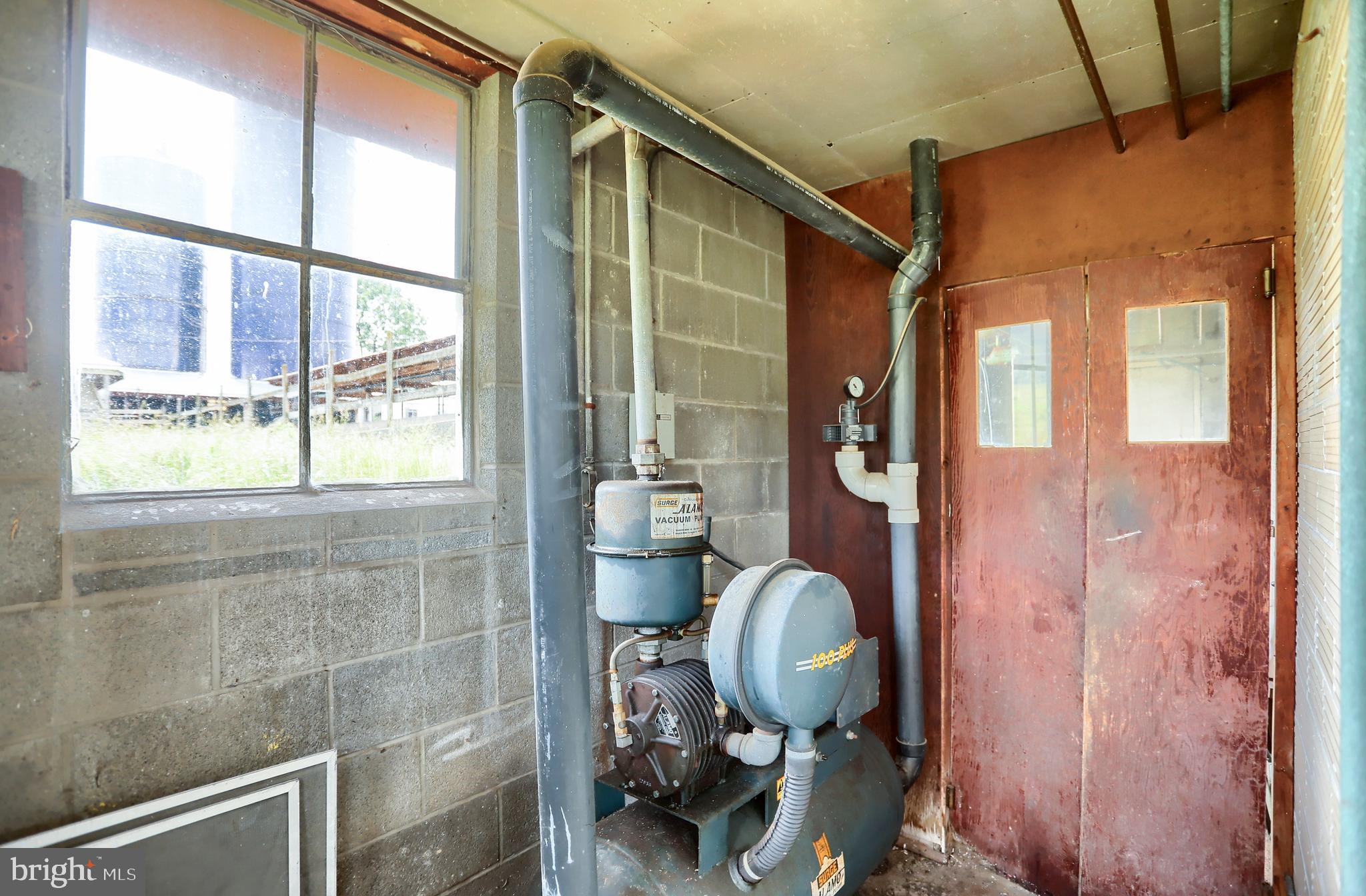 118 Bunker Hill Road Belleville, PA 17004 - Photo 49 of 90 a bathroom with a granite countertop shower a mirror and a toilet