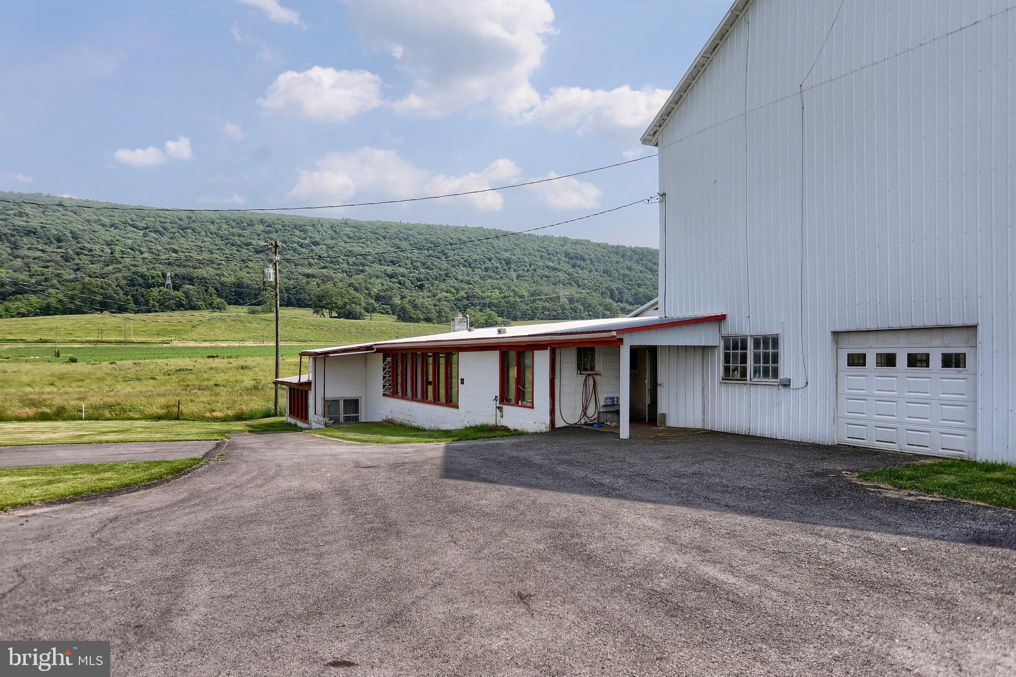 118 Bunker Hill Road Belleville, PA 17004 - Photo 62 of 90 a view of a house with a yard and a large tree