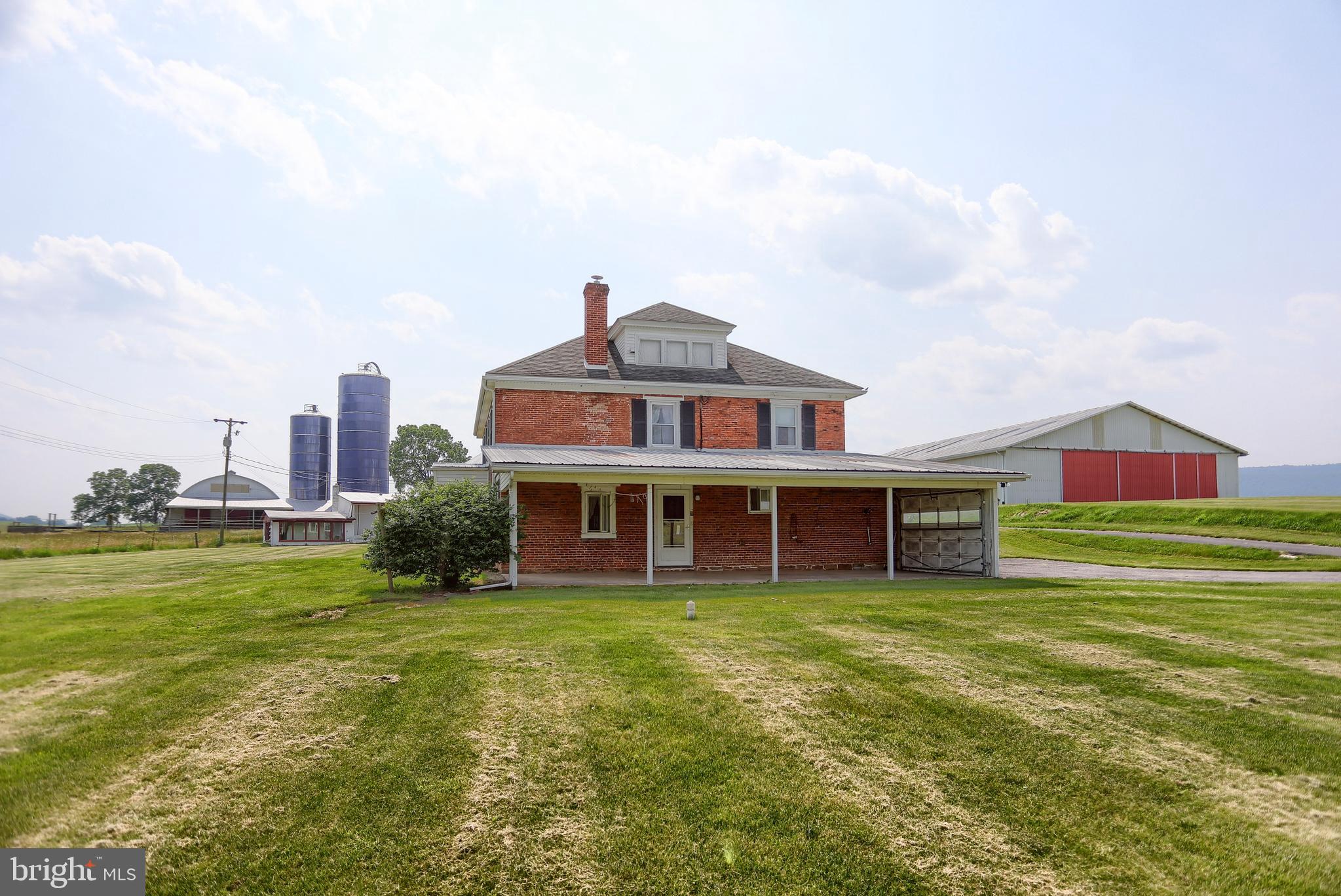 118 Bunker Hill Road Belleville, PA 17004 - Photo 66 of 90 a view of a house next to a big yard with large trees