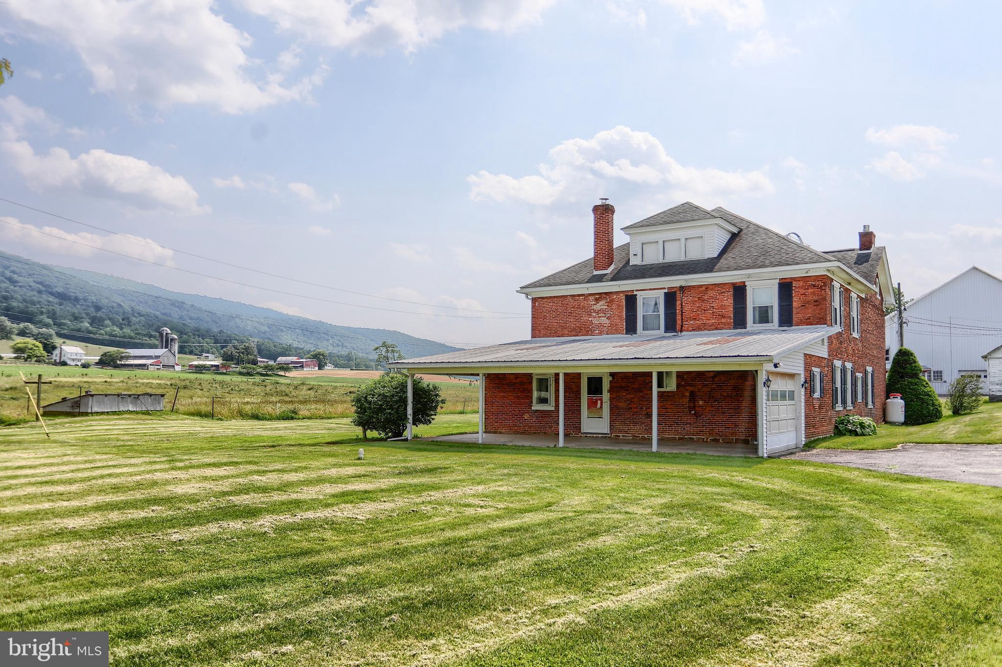 118 Bunker Hill Road Belleville, PA 17004 - Photo 68 of 90 a view of a large building with a big yard and large trees