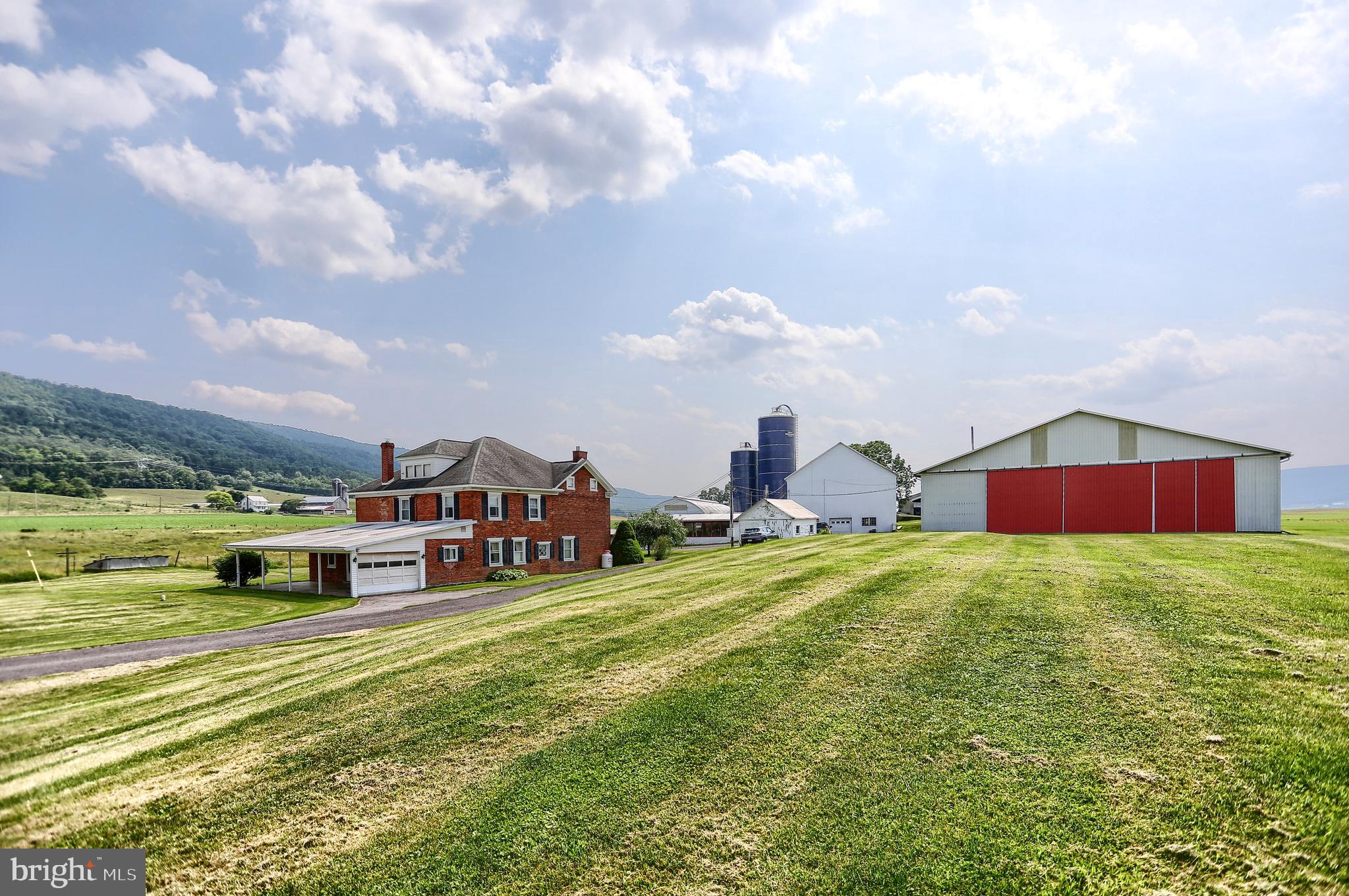 118 Bunker Hill Road Belleville, PA 17004 - Photo 69 of 90 a aerial view of a house with a big yard and large trees