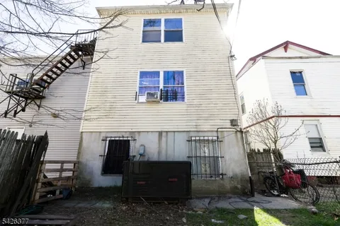 a view of yard with patio