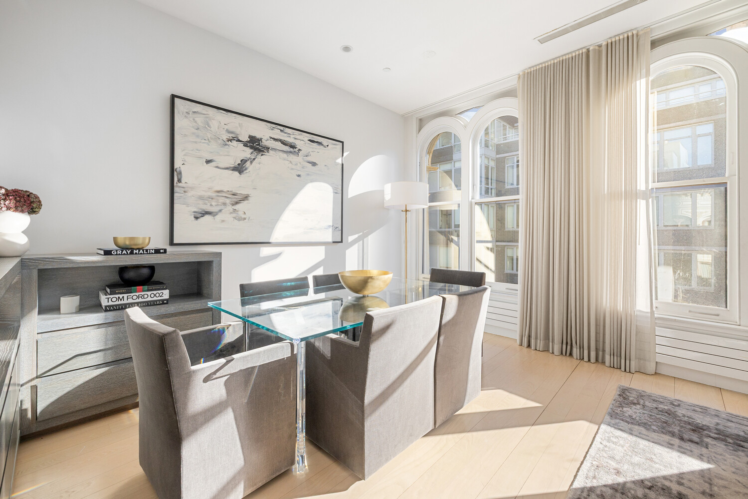 85 Leonard Street, Unit PH Manhattan, NY 10013 - Photo 3 of 21 a view of a dining room with furniture and window