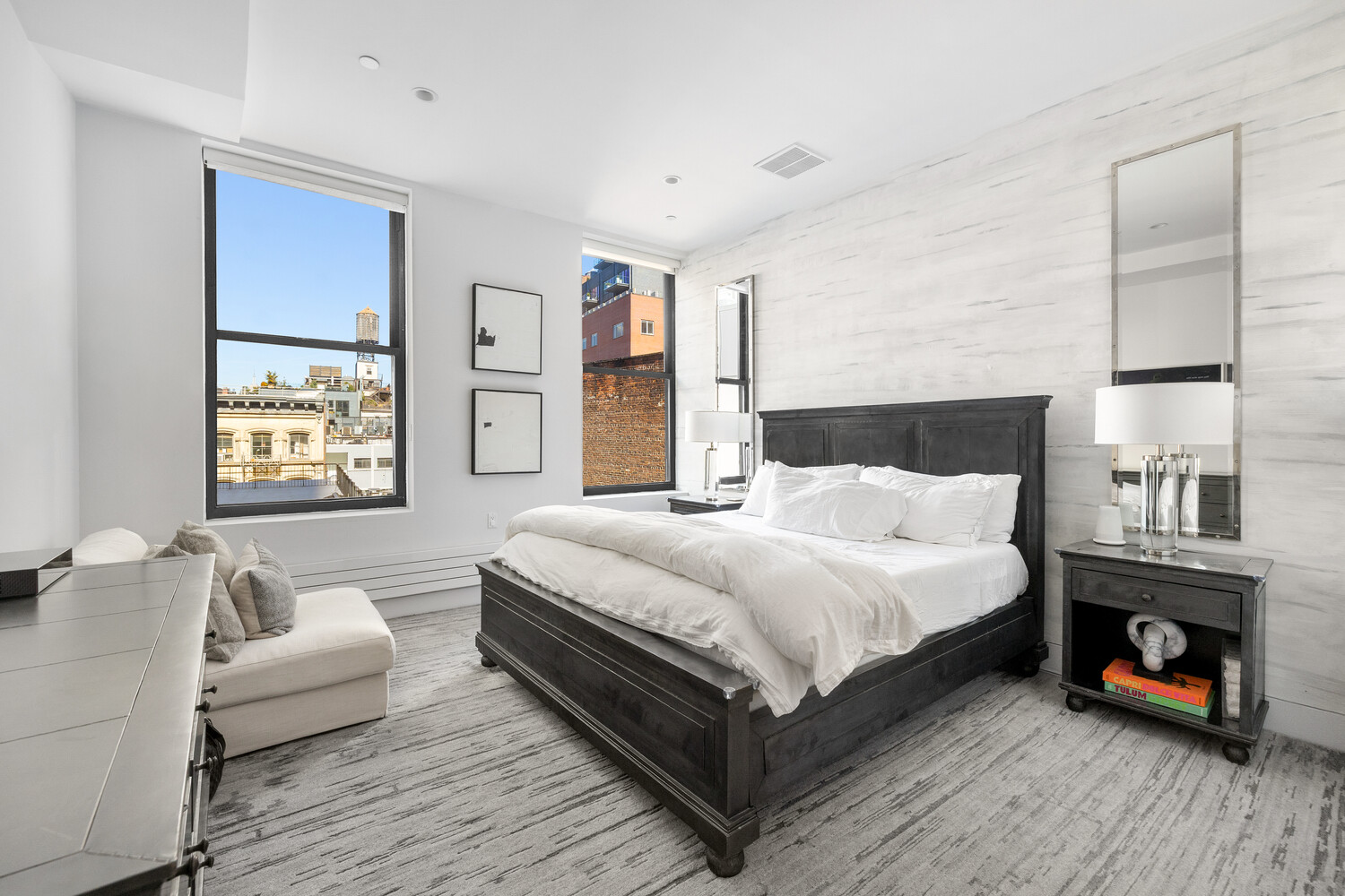 85 Leonard Street, Unit PH Manhattan, NY 10013 - Photo 9 of 21 a bedroom with a bed and a couch