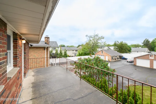 a view of a porch and garden