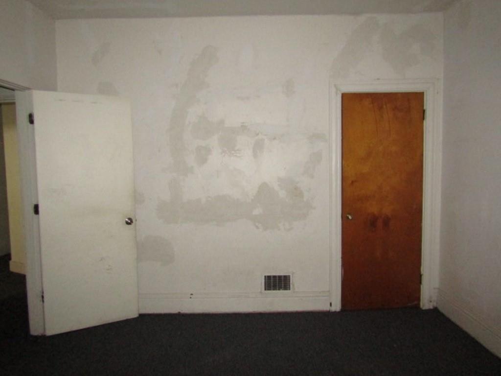 2348 McCook Street Pittsburgh, PA 15212 - Photo 20 of 27 an empty room with a wooden floor