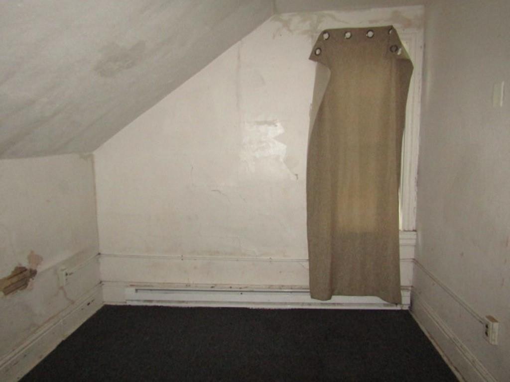 2348 McCook Street Pittsburgh, PA 15212 - Photo 23 of 27 view of empty room with wooden floor and fan
