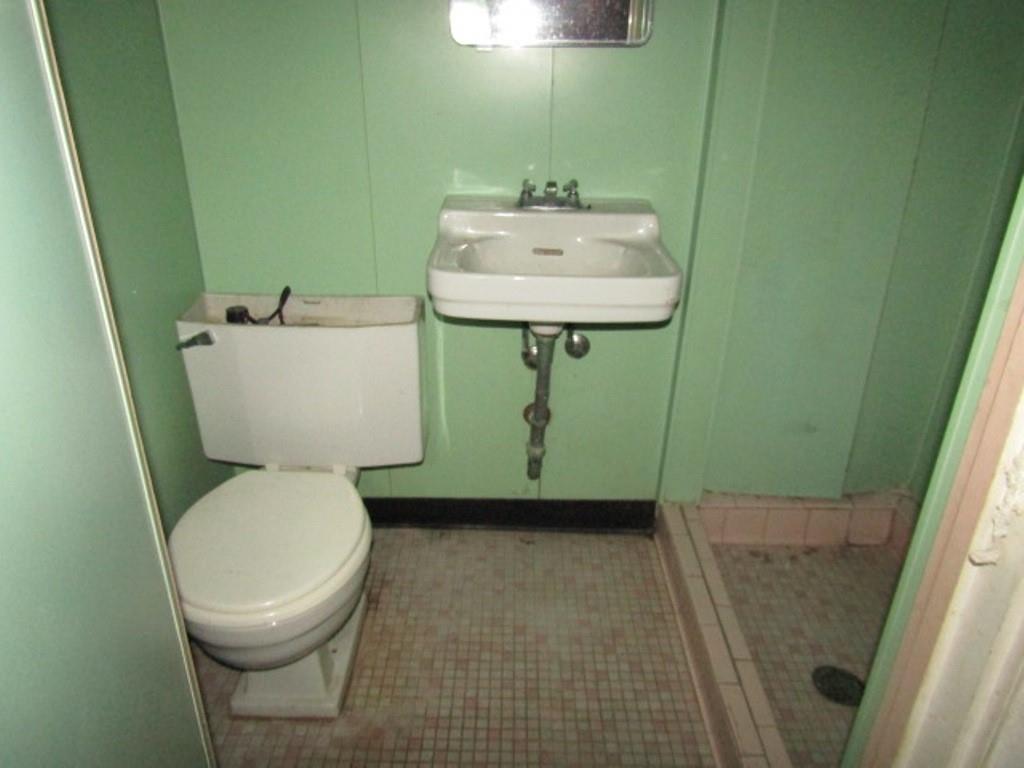 2348 McCook Street Pittsburgh, PA 15212 - Photo 25 of 27 a bathroom with a toilet and a sink