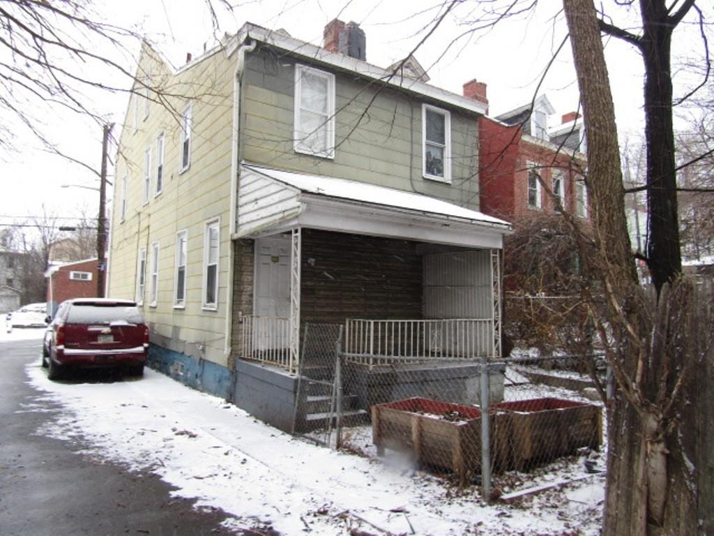 2348 McCook Street Pittsburgh, PA 15212 - Photo 4 of 27 a car parked in front of a house