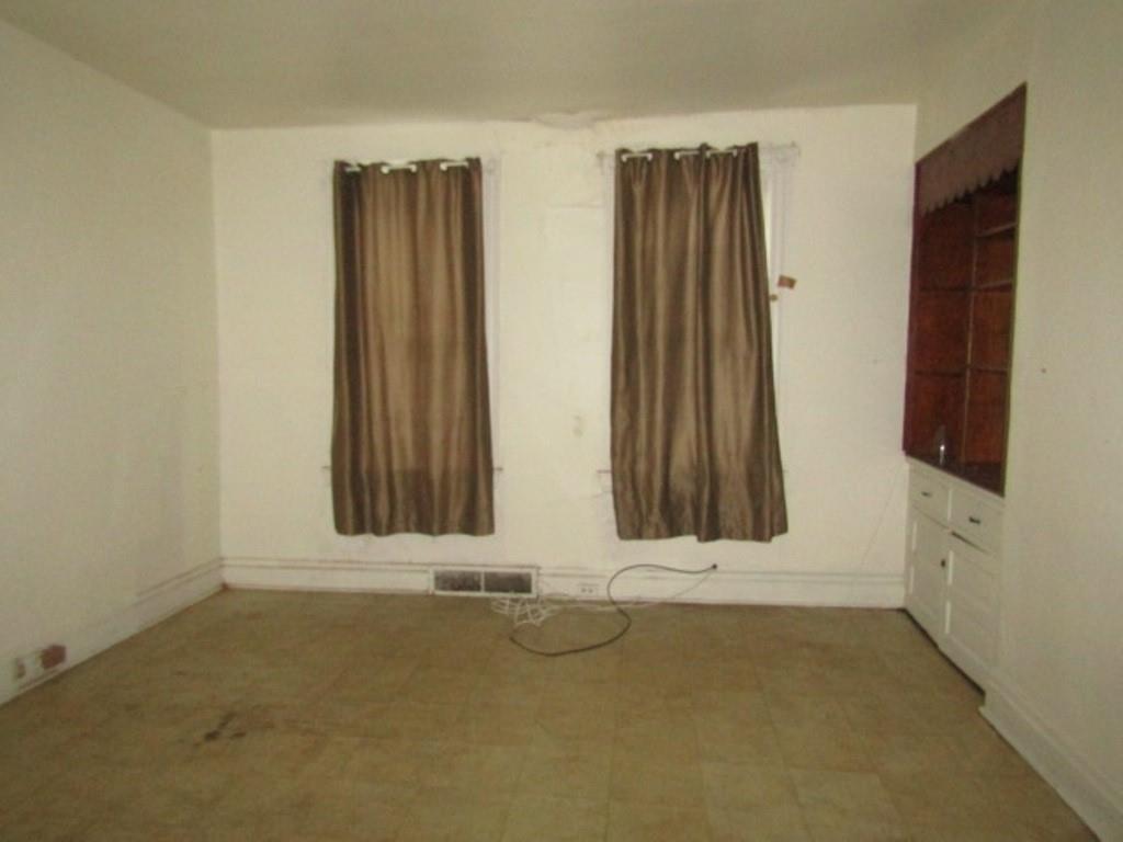 2348 McCook Street Pittsburgh, PA 15212 - Photo 8 of 27 an empty room with wooden floor and windows