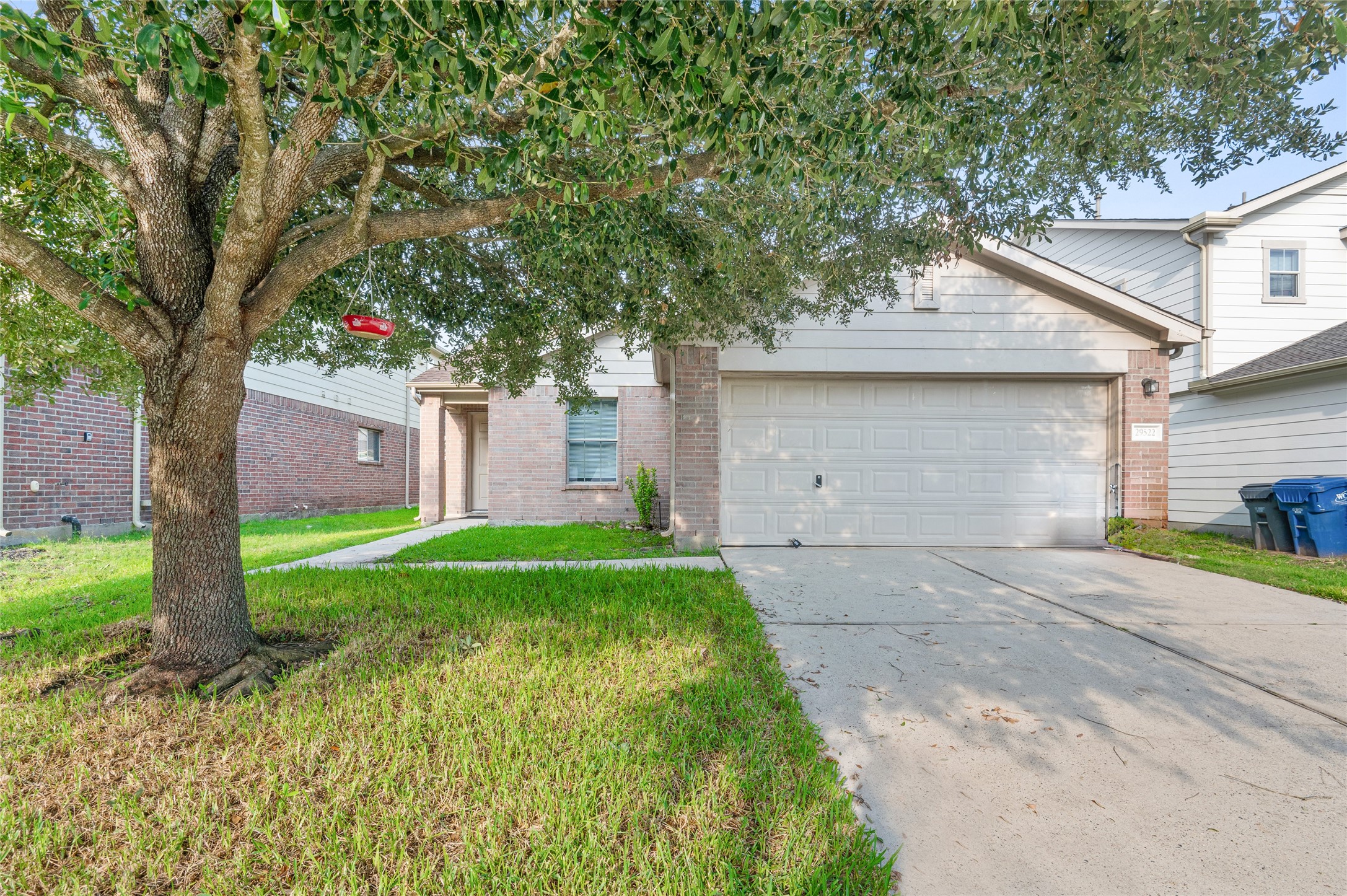29522 Legends Stone Drive Spring, TX 77386 - Photo 1 of 17 a front view of a house with a yard and a garage