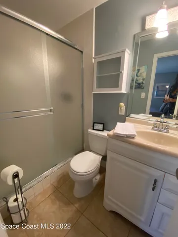 a bathroom with a toilet and a sink