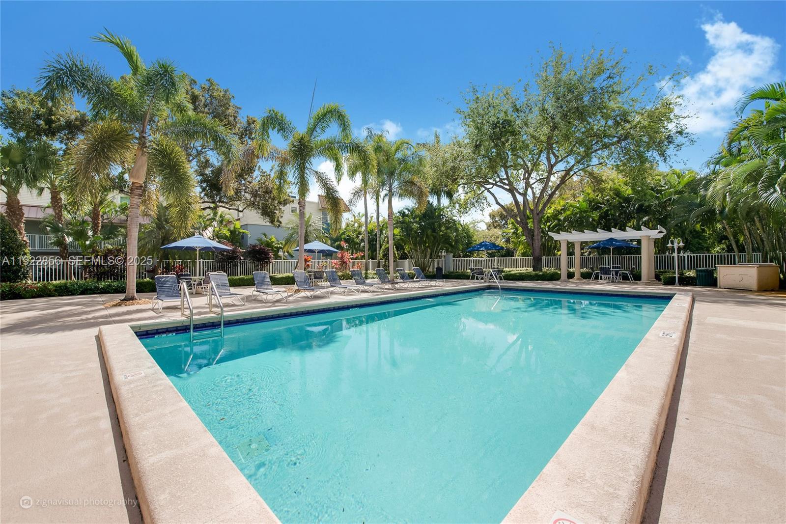 4600 Southwest 67th Avenue, Unit 125 Miami, FL 33155 - Photo 11 of 11 a view of a swimming pool with a patio