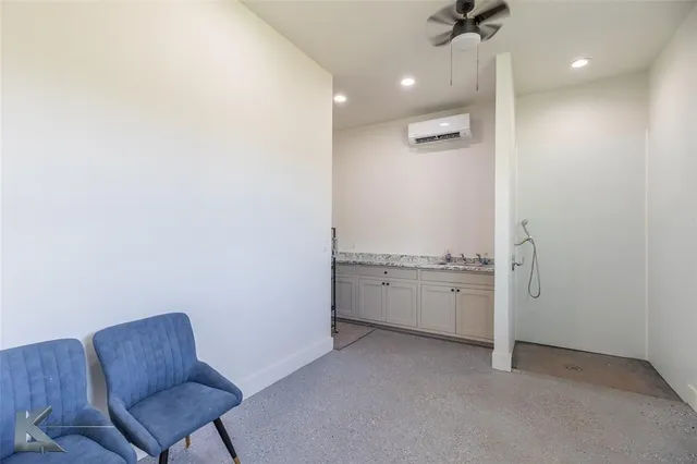 a room with a chair and couch