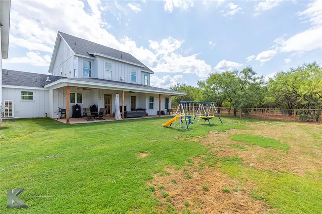 a view front of house with a yard