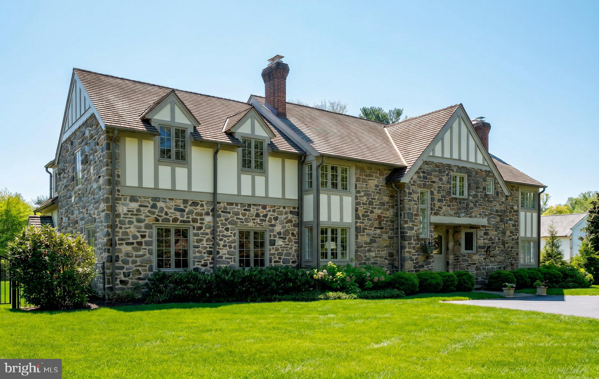 617 Harriton Road Bryn Mawr, PA 19010 - Photo 2 of 34 Charming stone residence with lush lawn.