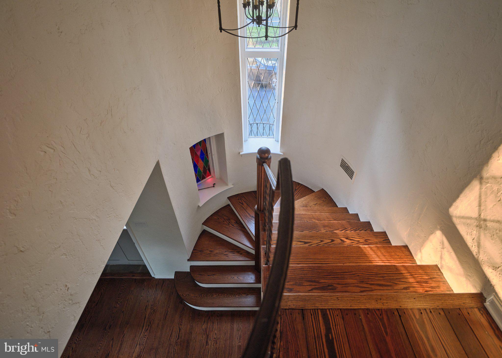 617 Harriton Road Bryn Mawr, PA 19010 - Photo 28 of 34 Elegant spiral staircase with light.