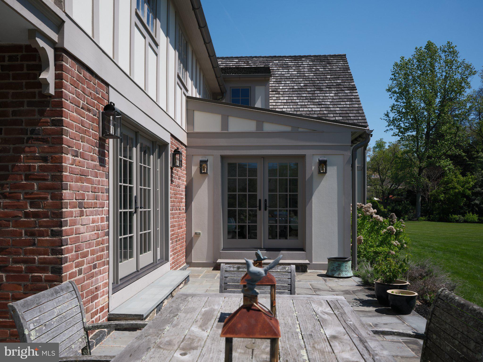 617 Harriton Road Bryn Mawr, PA 19010 - Photo 4 of 34 Charming patio with lush greenery.