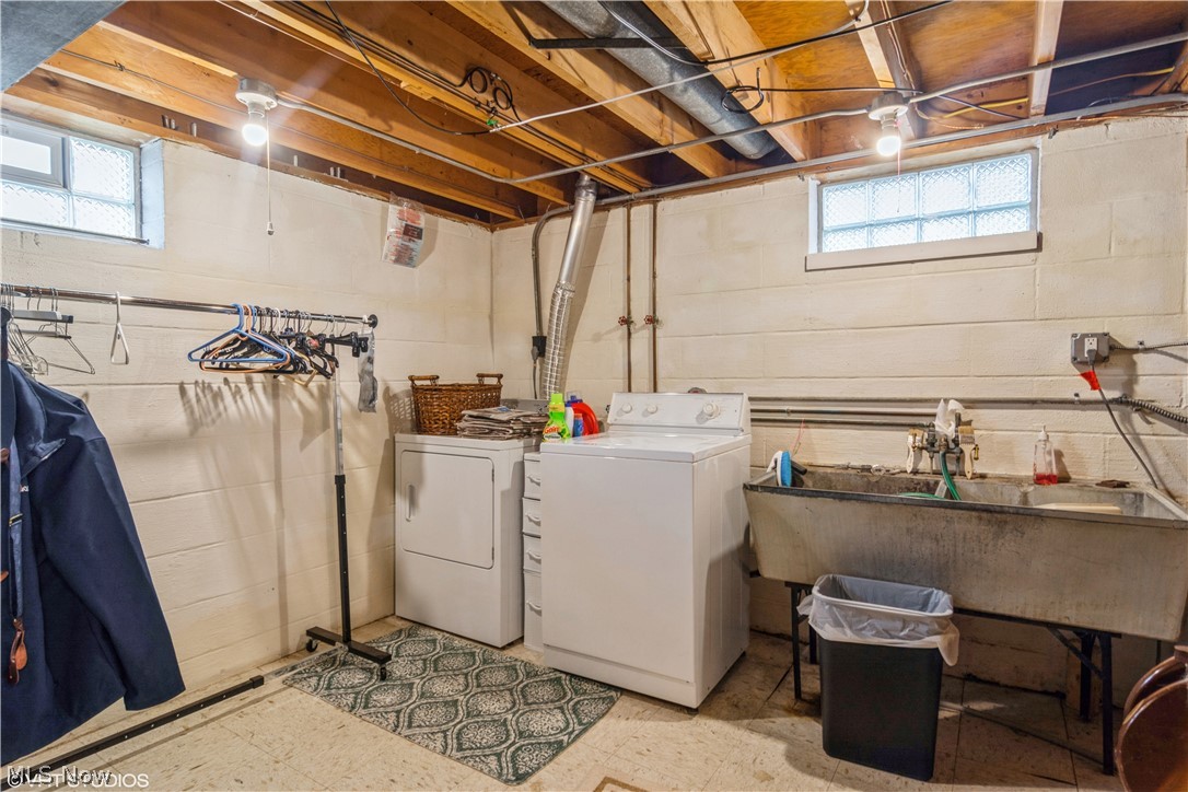 9283 Roxbury Road Parma Heights, OH 44130 - Photo 21 of 24 Laundry room. Note the basement has glass block windows.