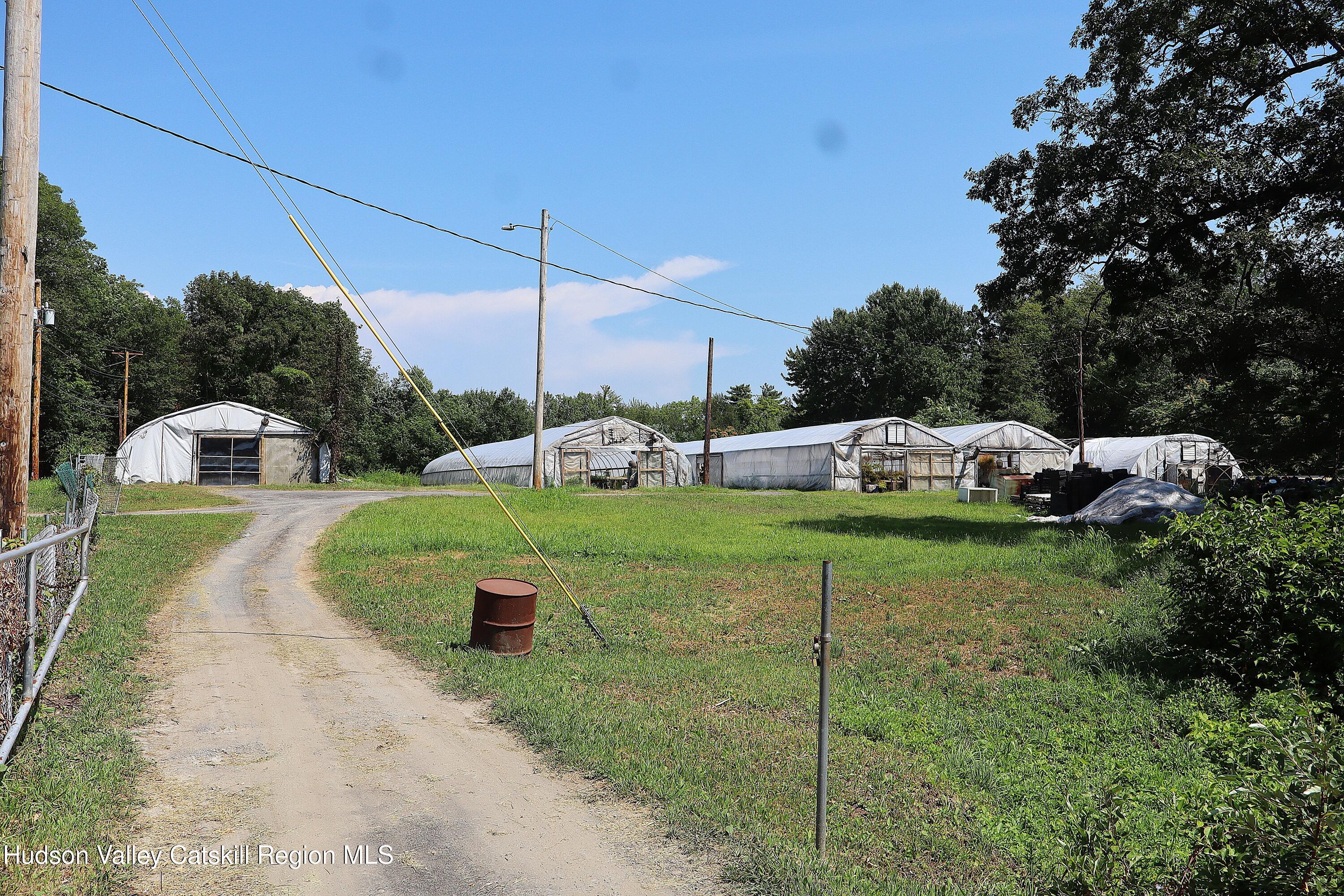 2050 Sawkill Ruby Road Kingston, NY 12401 - Photo 17 of 38 a view of a house with a backyard