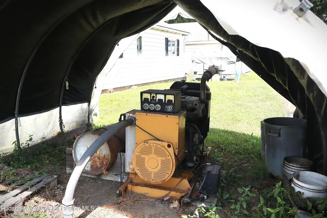 a view of a porch with furniture