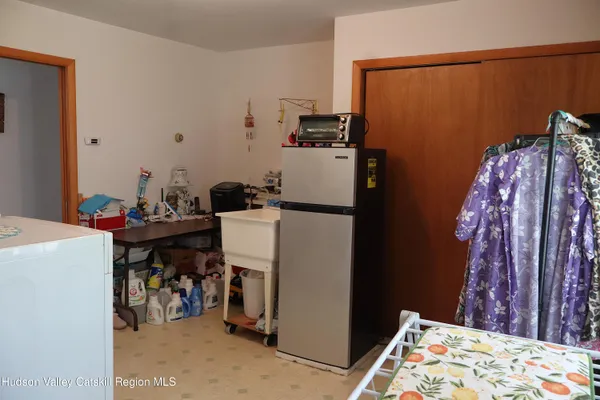 a bedroom with a bed and a bed