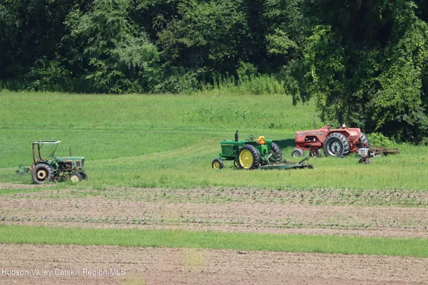 a view of a table and chair in the garden