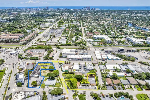 an aerial view of residential building and parking space