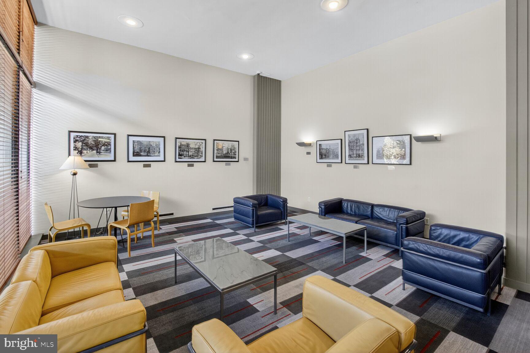 1711 Massachusetts Avenue Northwest, Unit 825 Washington, DC 20036 - Photo 12 of 16 a living room with furniture