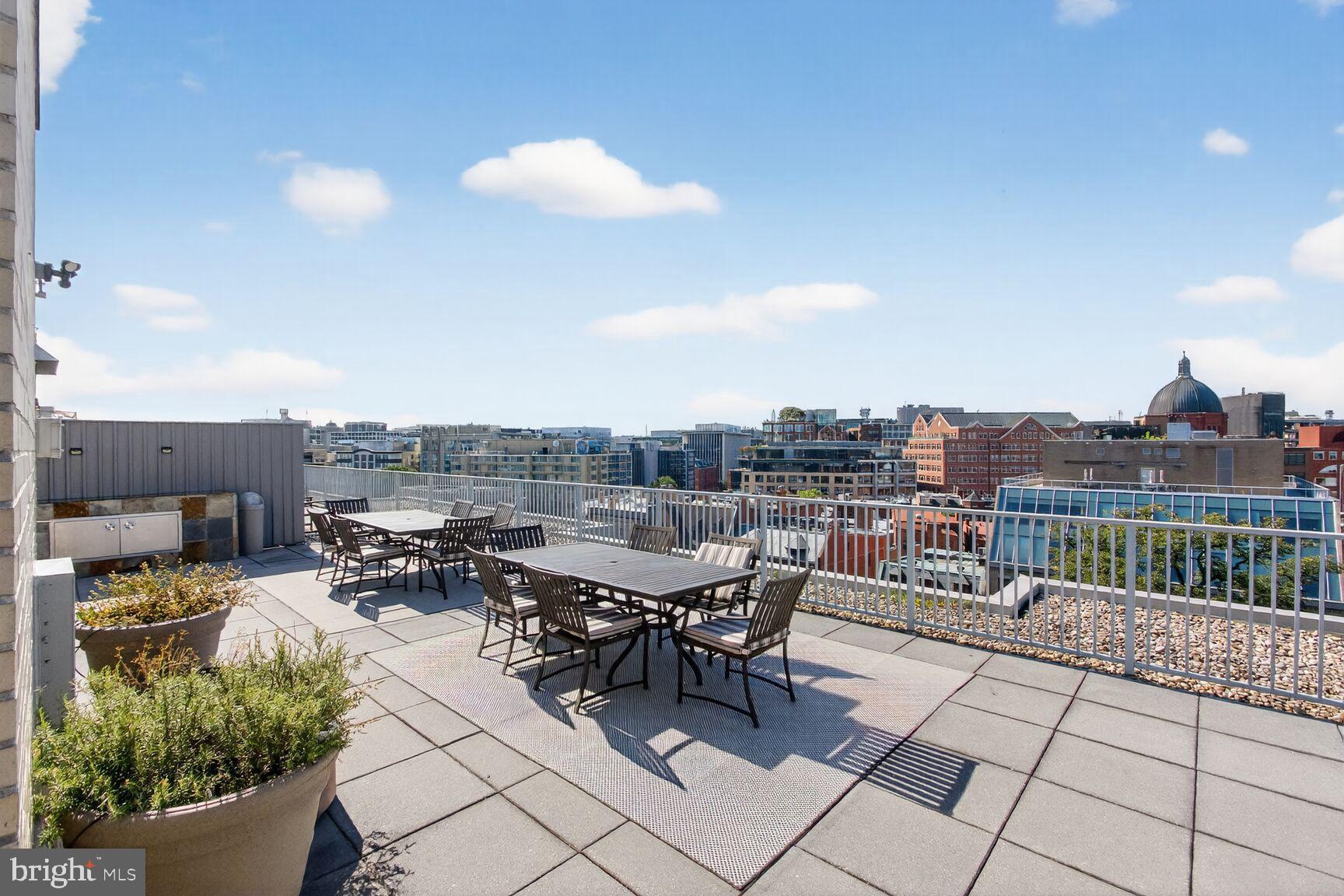 1711 Massachusetts Avenue Northwest, Unit 825 Washington, DC 20036 - Photo 13 of 16 a view of a terrace with furniture