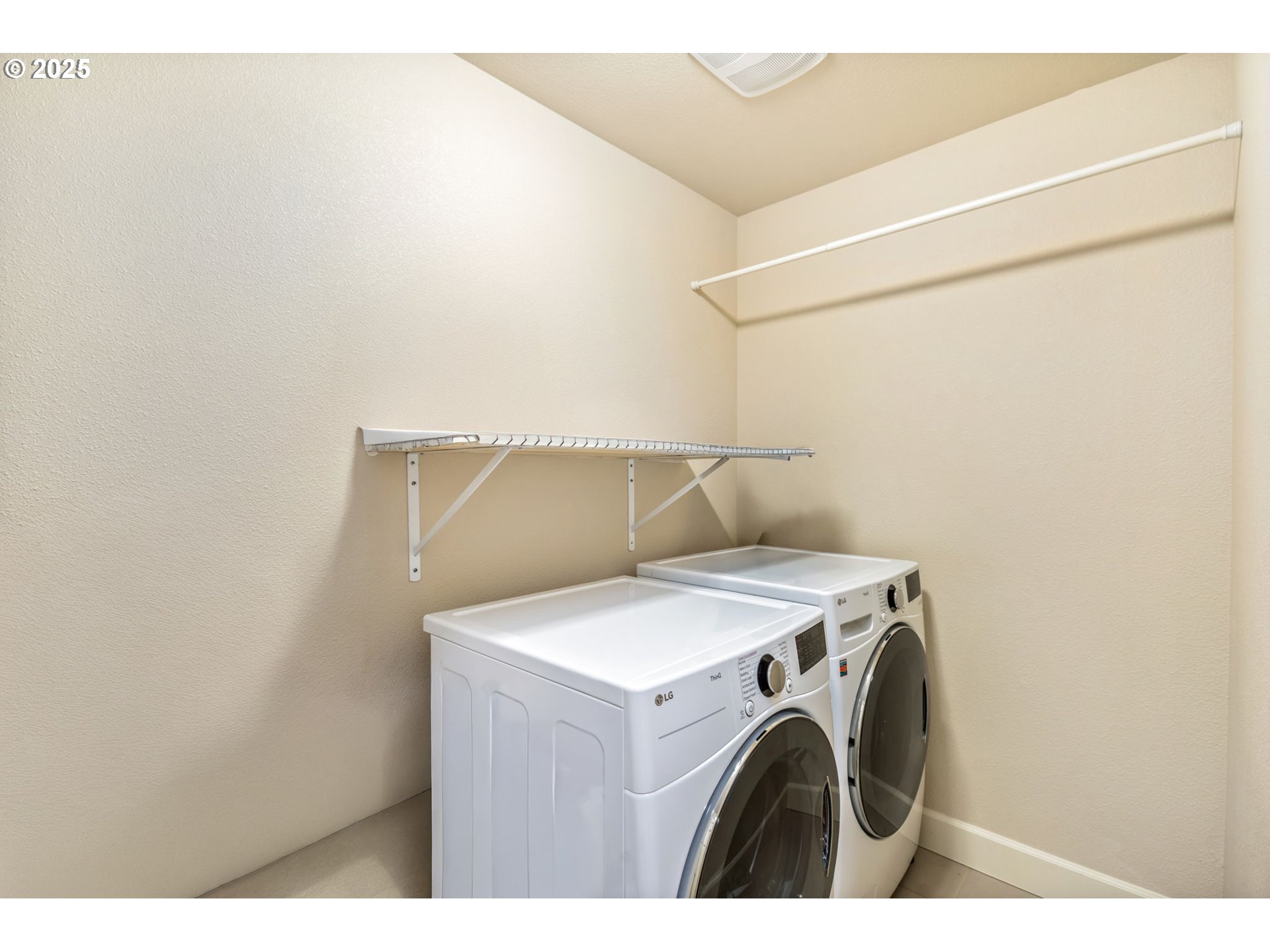 8826 Southwest Spruce Street Portland, OR 97223 - Photo 26 of 34 a utility room with dryer and washer